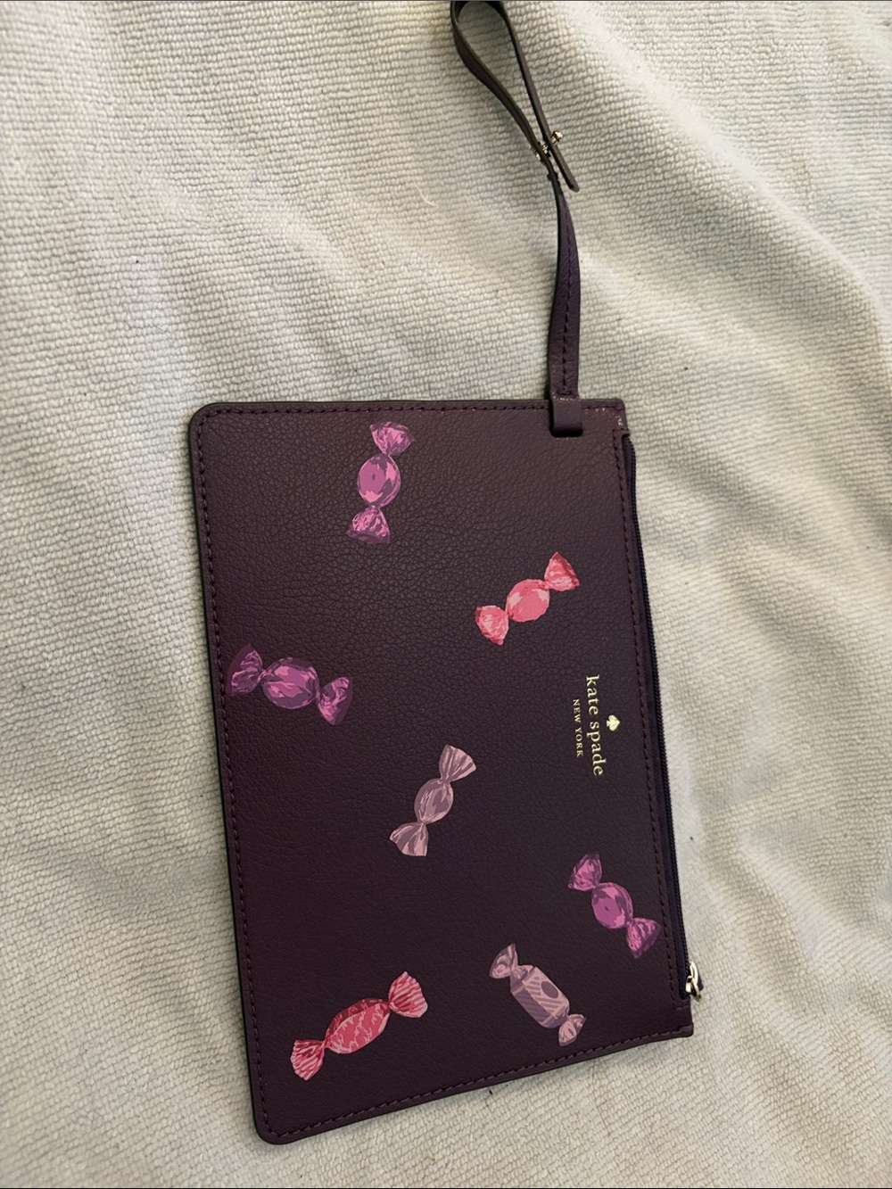 kate spade plum leather wristlet with pink candy print